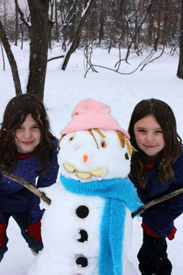 Lexi and Lucie with the Edible Snowman in January 2011.